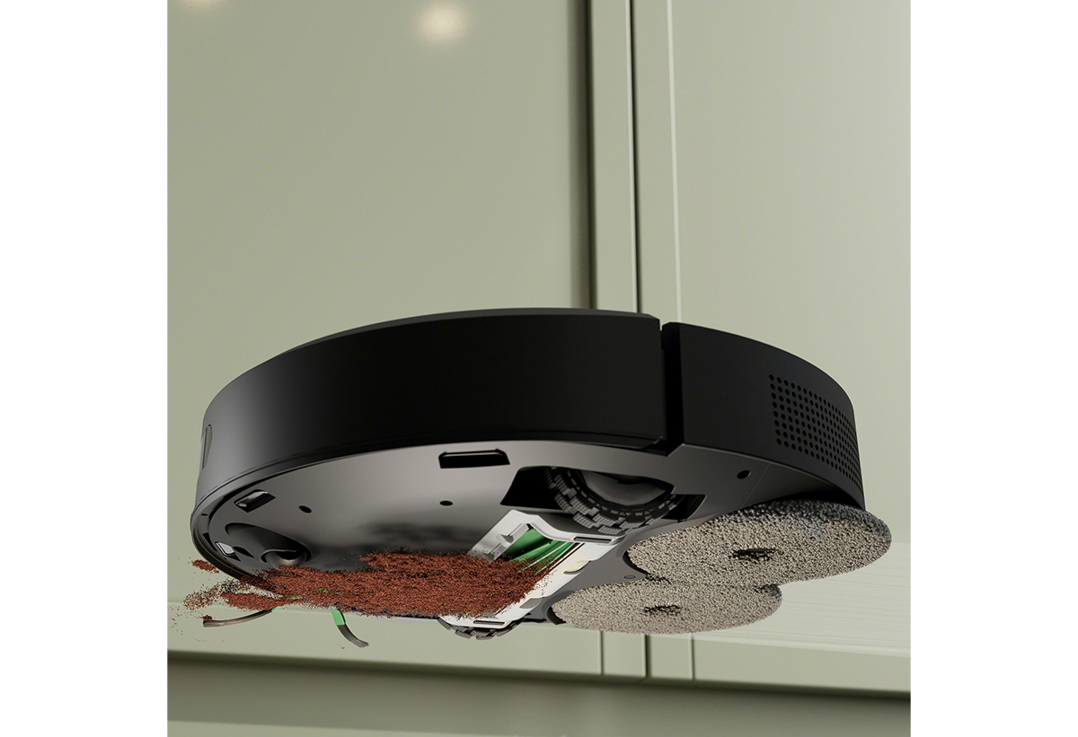 Φαίνεται η σκούπα να αποροφά σκόνη και βρωμίες από το πάτωμα.